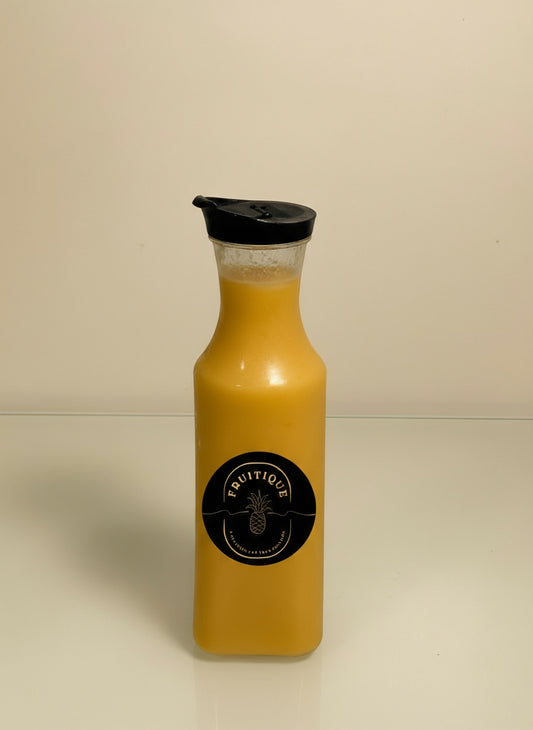 Yellow bottle with black cap and label on a white background